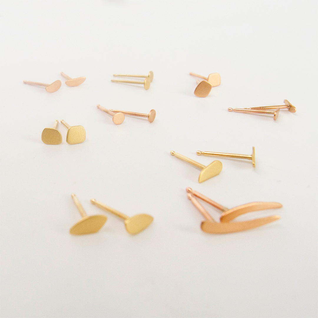 18 karat yellow and rose gold studs