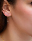 floating diamond line earrings