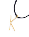 K lettres pendant with pavé diamonds