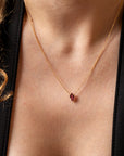 caged sapphire pendant