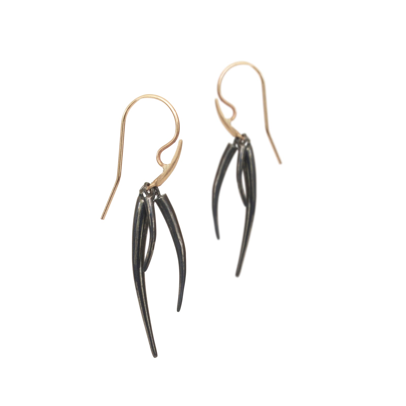 medium / sterling silver plated in black rhodium/14k yellow gold ankole tassle earrings