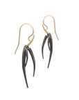 medium / sterling silver plated in black rhodium/14k yellow gold ankole tassle earrings
