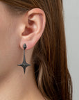 pavé lis dangle earrings