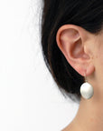 large disc drop earrings