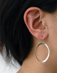 large rounded oculus earrings