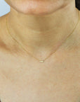 tiny totem necklace