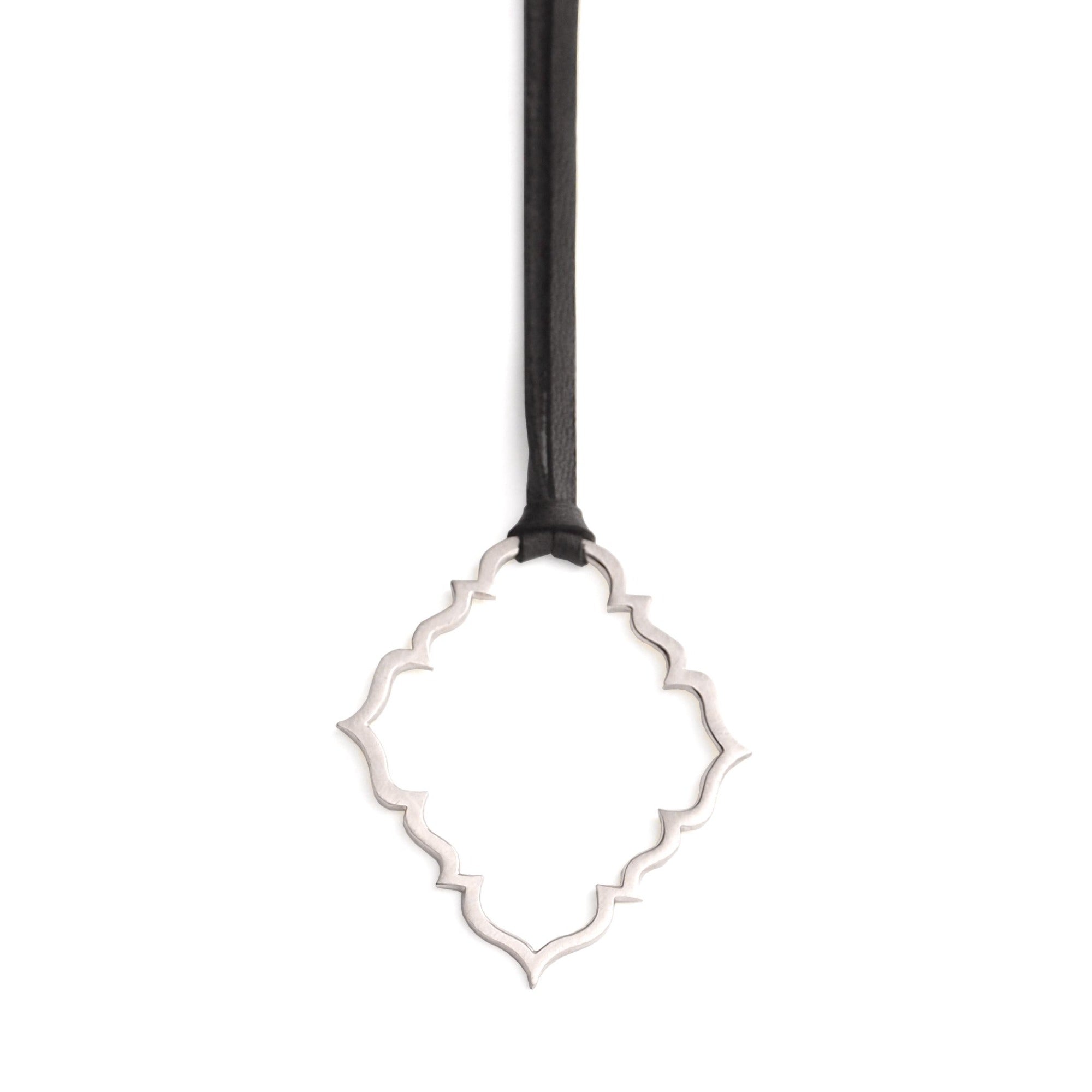 sterling silver on 34" leather cord portail pendant