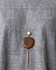 wood oval and point pendant