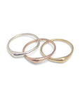 set of three in sterling silver, 14k yellow gold and 14k rose gold / matte / 5 swell stacking rings