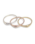 set of three in sterling silver, 14k yellow gold and 14k rose gold / 5 swell stacking rings