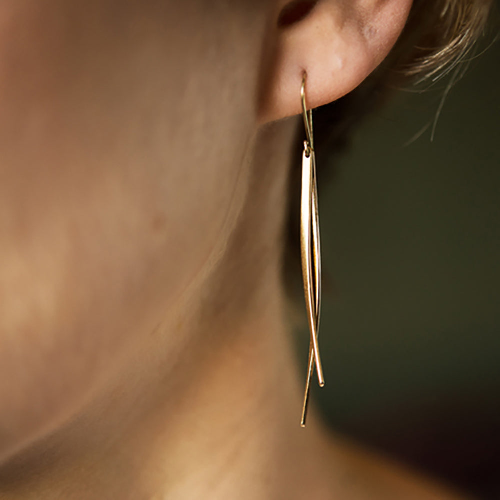 double sliver earrings on model