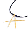A lettres pendant with pavé diamonds