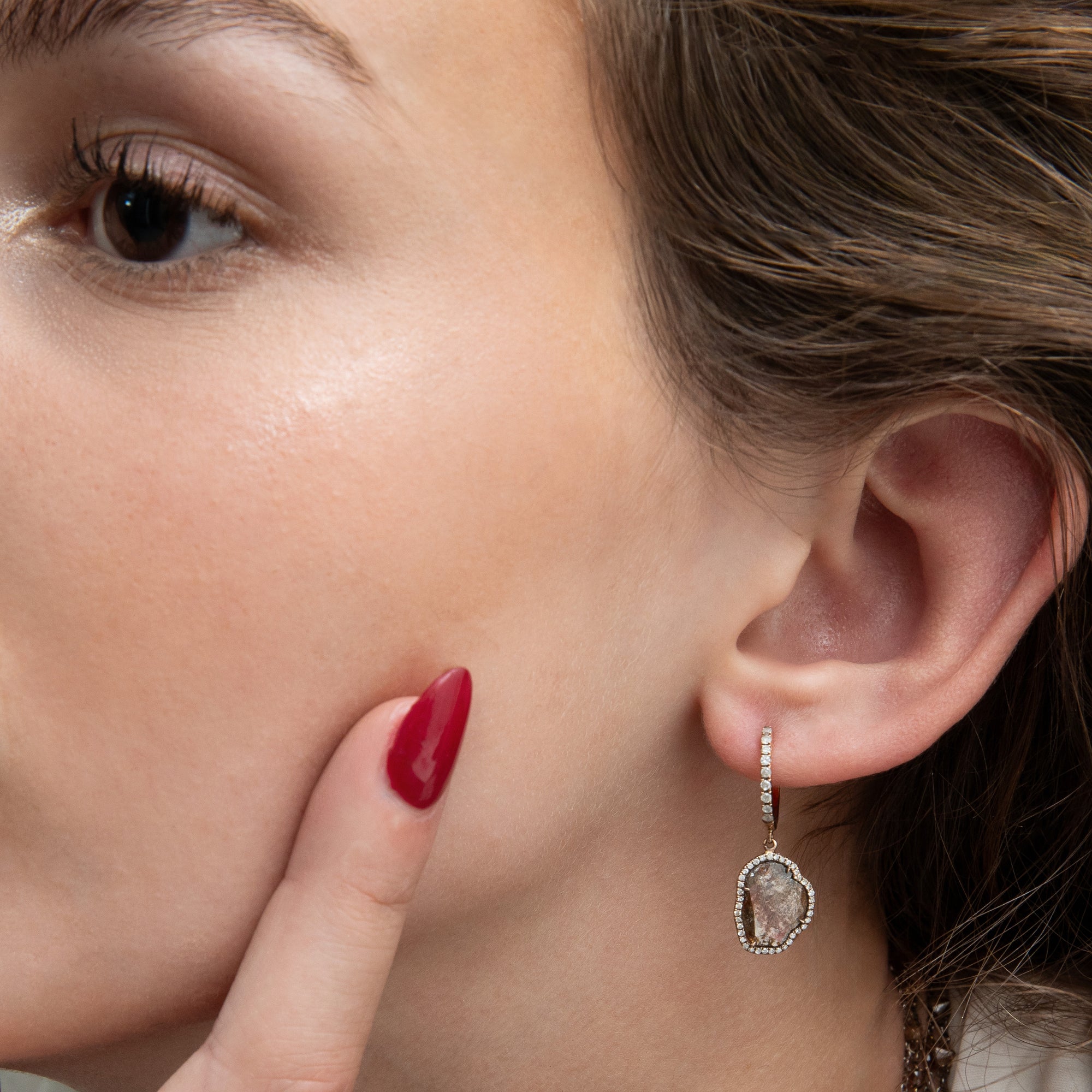 diamond slice dangle earring on model