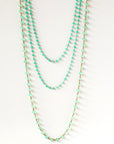 layered emerald-bead-necklaces