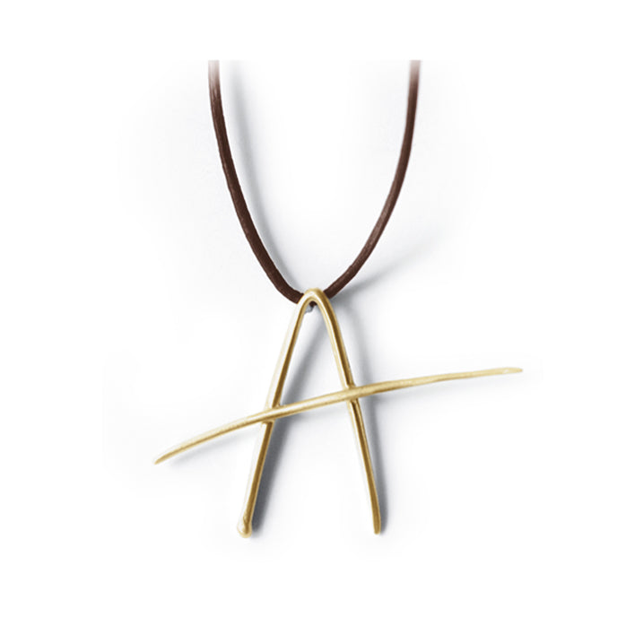 A / 14k yellow gold lettres pendant