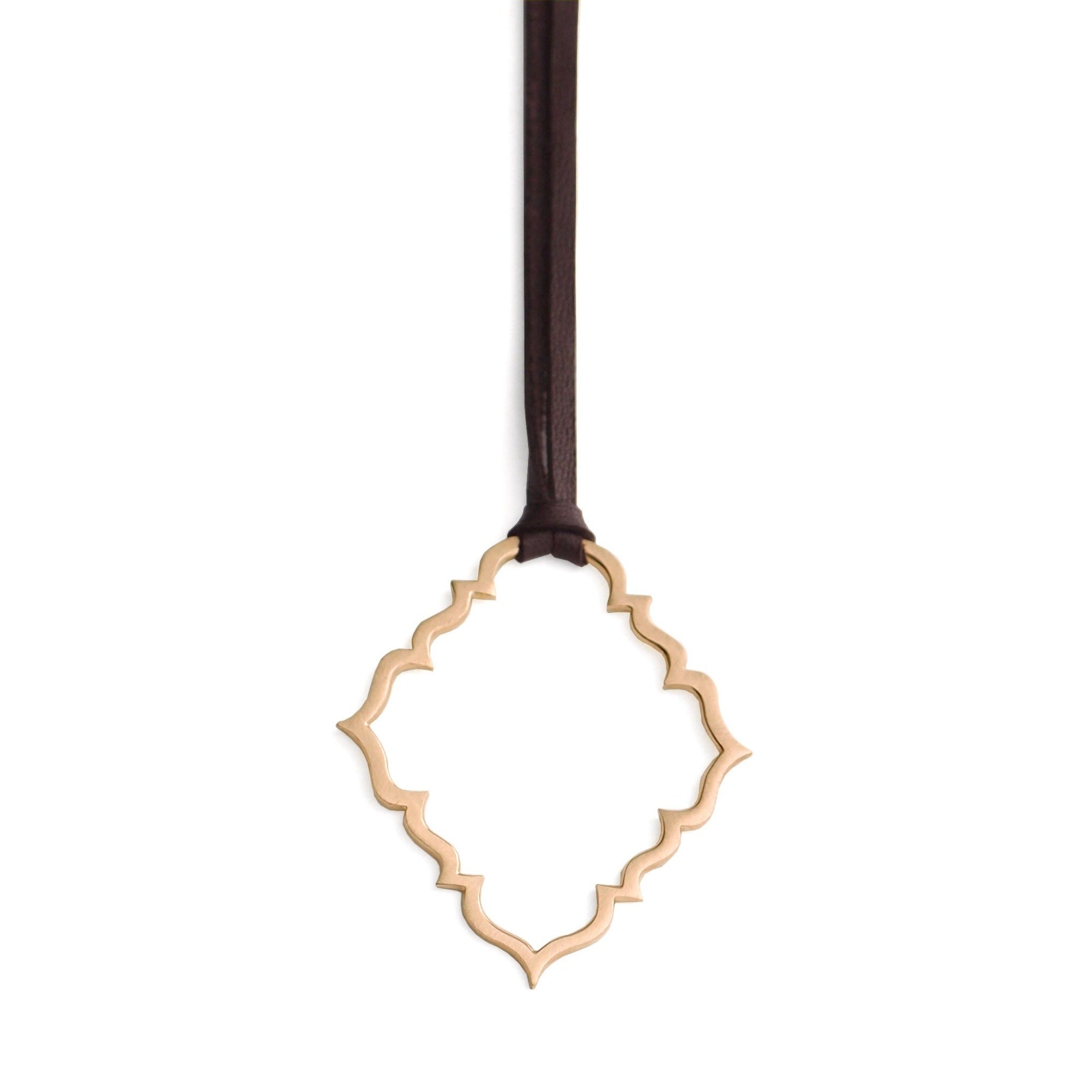 14k yellow gold on 34" leather cord portail pendant