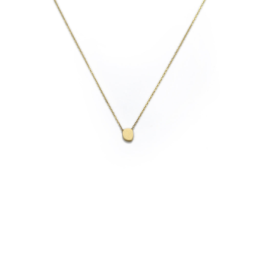 18k yellow gold / kernel tiny totem necklace