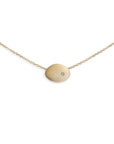 14k yellow gold with white diamond small disc necklace