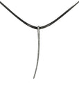 14k white gold pendant plated in black rhodium with white diamonds on leather choker cord with adjustable clasp pavé curved stake choker