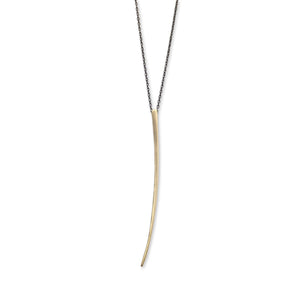 14k yellow gold pendant on an oxidized silver chain curved stake pendant