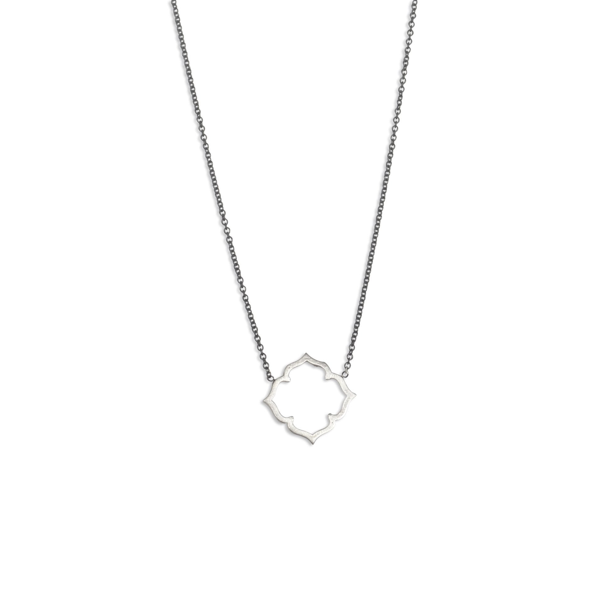 sterling silver on an oxidized chain clover necklace