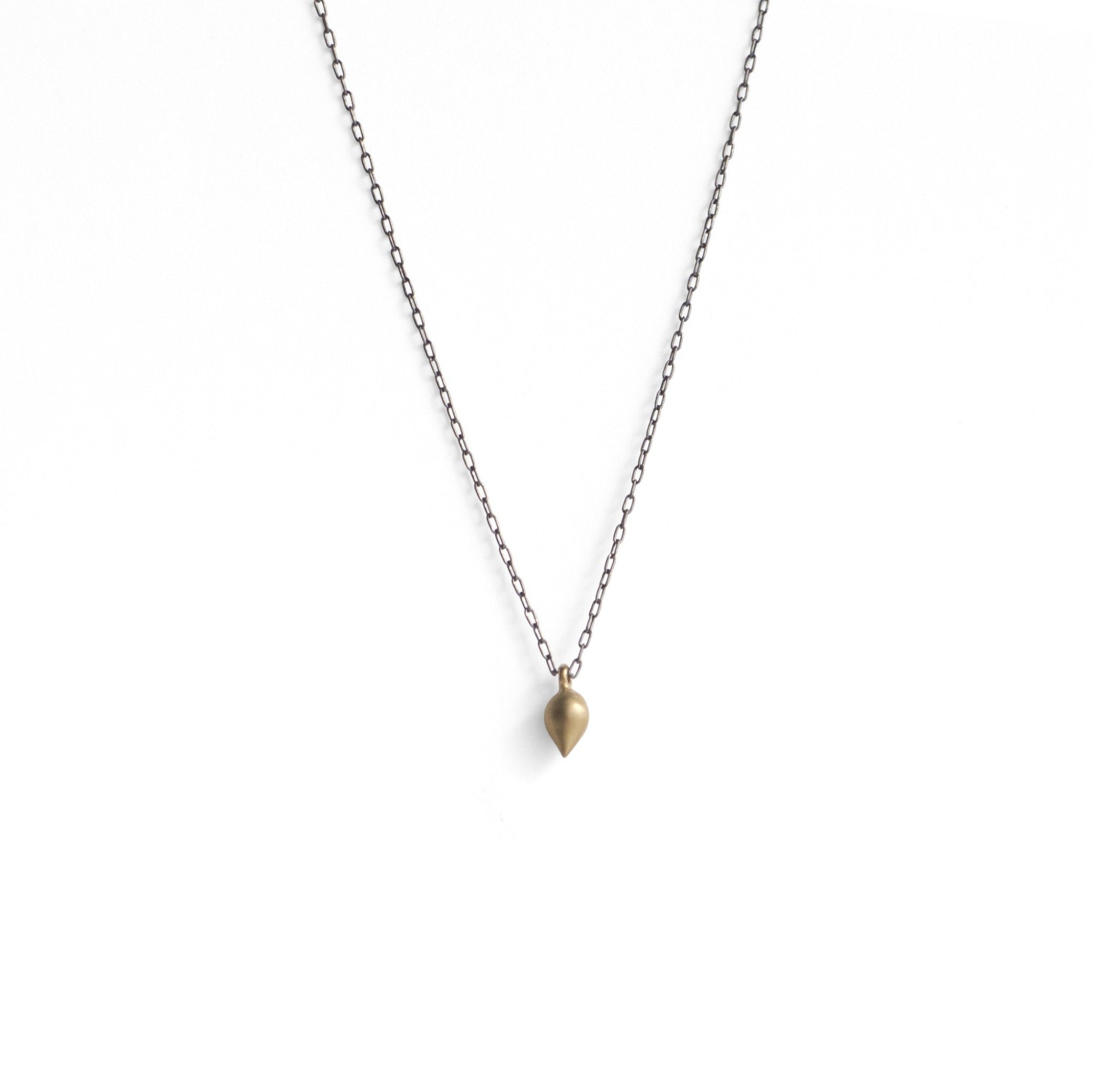 14k yellow gold/oxidized sterling silver chain tiny pod necklace